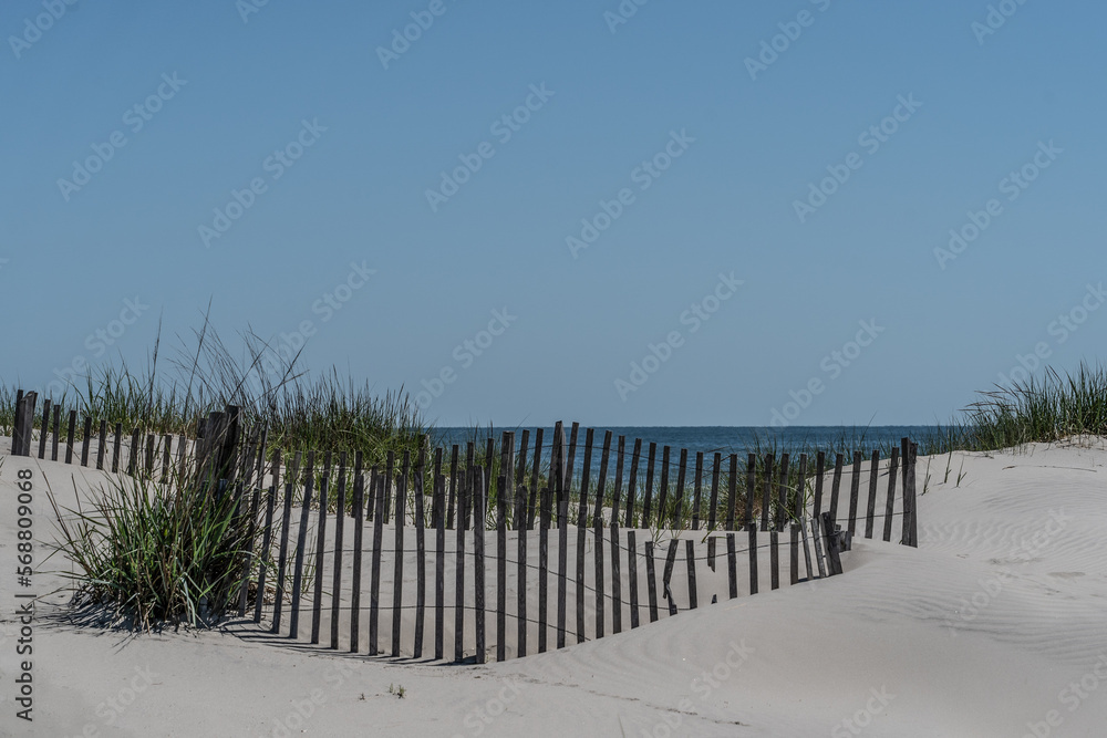 Waves, sand and blue sky on beach in Stone Harbor, New Jersey Waves, sand and blue sky on beach in Stone Harbor, New Jersey