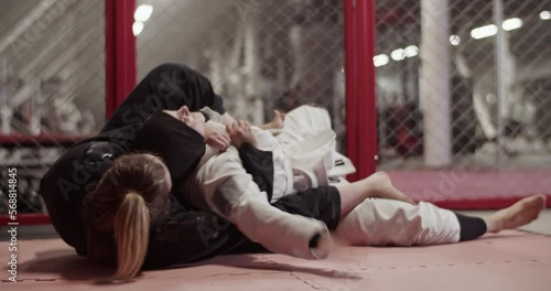 Muslim woman trying to escape chokehold