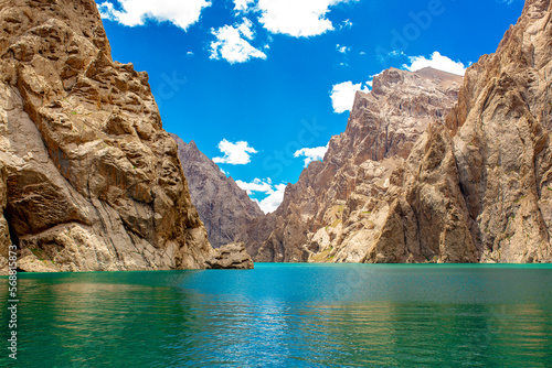 Mountain blue lake among the rocks. Beautiful landscape. Wonderful nature. Long banner, panoramic view