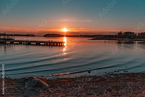 Sunset on the sea, small pier