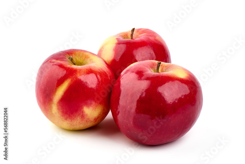 Shiny red apples, isolated on white background.