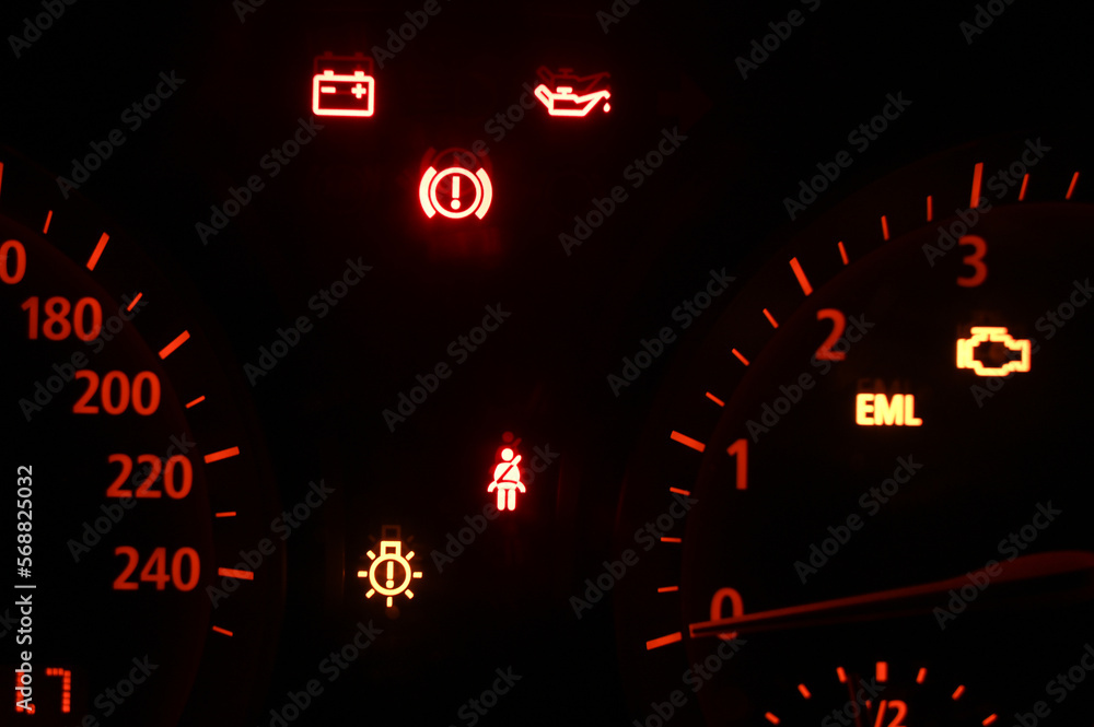 Warning lights on dashboard in the car. Red and orange warning lights in vehicle. 스톡 사진 Adobe