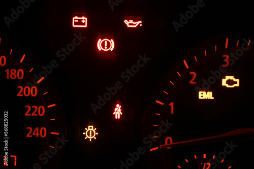 Warning lights on dashboard in the car. Red and orange warning lights in vehicle.