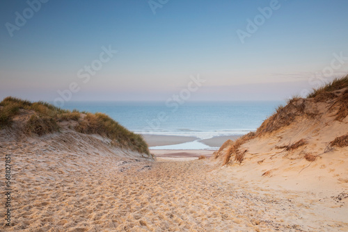 path to sea beach between two dunes