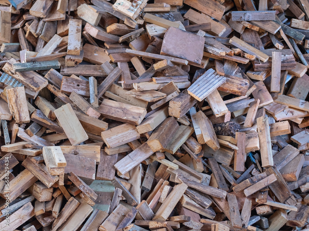 A heap of wood pieces for use as fuel A heap of wood pieces for use as fuel