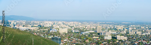 Panorama of the city of Almaty from a height. A beautiful city of Kazakhstan. © Сергей Дудиков