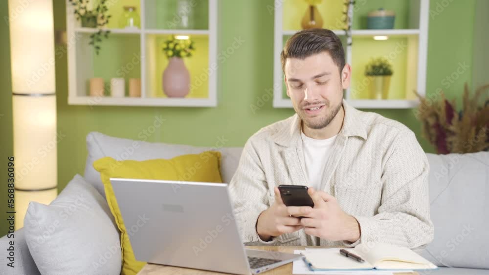 Young happy man texting with his friend, girlfriend on the phone.
Happy man laughing and texting someone on his phone.
Young happy man texting with his friend, girlfriend on the phone.
Happy man laughing and texting someone on his phone.
