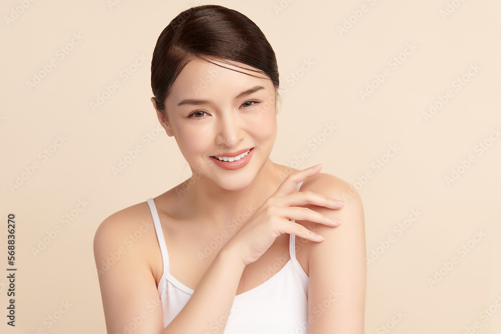 Beautiful young asian woman with clean fresh skin on beige background, Face care, Facial treatment, Cosmetology, beauty and spa, Asian women portrait. Beautiful young asian woman with clean fresh skin on beige background, Face care, Facial treatment, Cosmetology, beauty and spa, Asian women portrait.