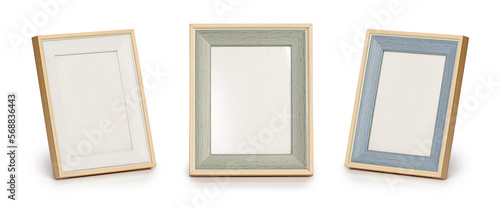 Desktop photo frame, Vertical standing brown wooden picture frame on white background,