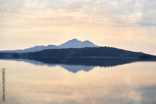 Machovo Jezero lake with the Bezdez castle in the morning