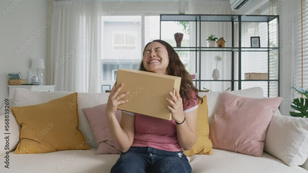 Asia people young woman smile love hug parcel box goods carton packaging happy joy awe face at home. Omni channel enjoy buy gift order postal at retail online shop store fast courier sending service. Asia people young woman smile love hug parcel box goods carton packaging happy joy awe face at home. Omni channel enjoy buy gift order postal at retail online shop store fast courier sending service.