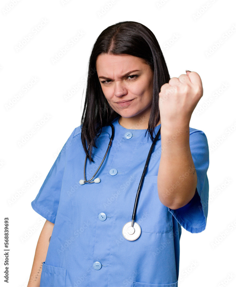 Young nurse woman isolated showing fist to camera, aggressive facial expression. Young nurse woman isolated showing fist to camera, aggressive facial expression.