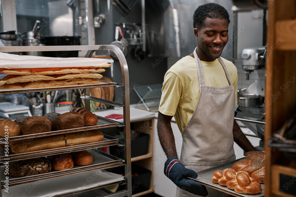 Man Working in Bakery Man Working in Bakery