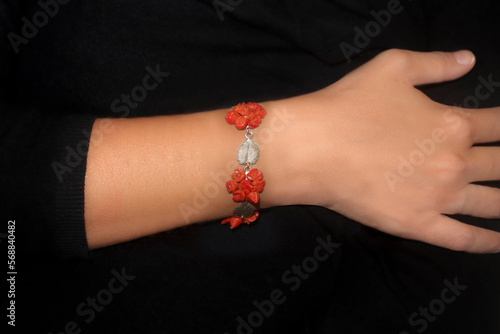 A lady's arm wearing a bracelet