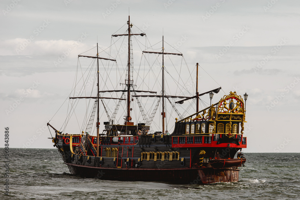 An old wooden sail ship at the sea. An old wooden sail ship at the sea.