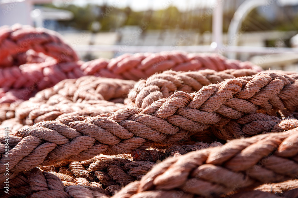 Fototapeta premium Braided thick ship rope close-up.