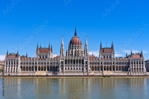 Budapest, Hungary - July 04, 2022: View of Hungarian Parliament Building, Royal Palace and Danube river.