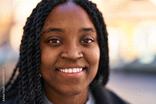African american woman smiling confident standing at street © Krakenimages.com