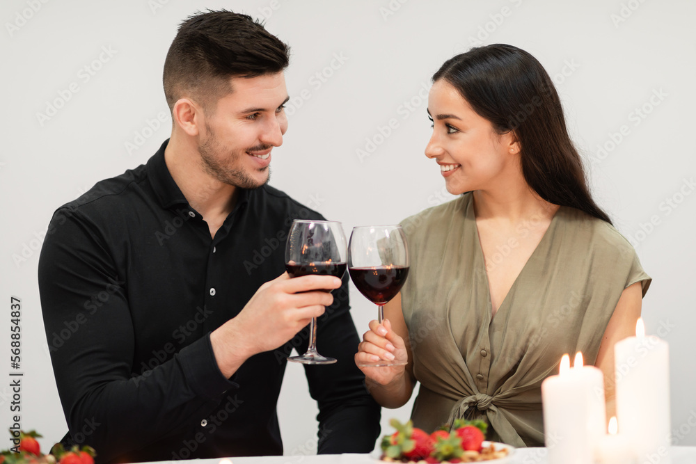 Happily married couple celebrating anniversary at home Happily married couple celebrating anniversary at home