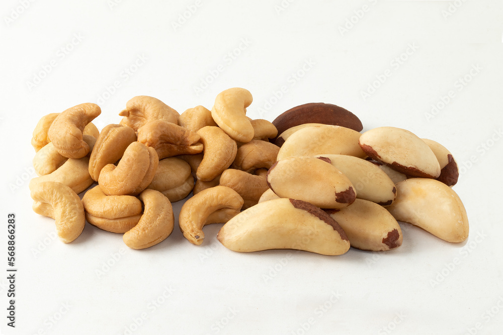 Typical Brazilian nuts: cashew and Pará on white background. Typical Brazilian nuts: cashew and Pará on white background.