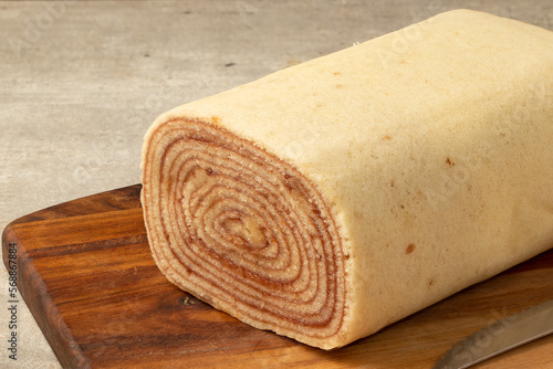 Typical Brazilian dessert roll cake stuffed with guava paste. photo