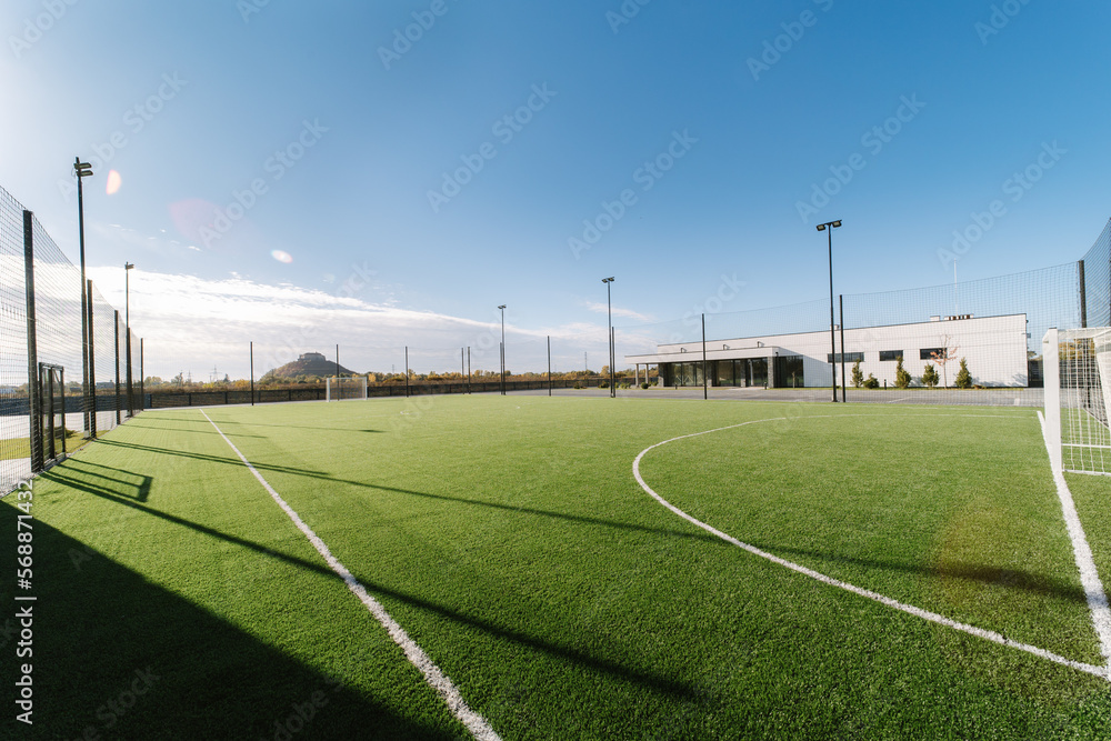 Fototapeta premium Soccer field and stadium. The morning before the match. Wide angel, general view of the field