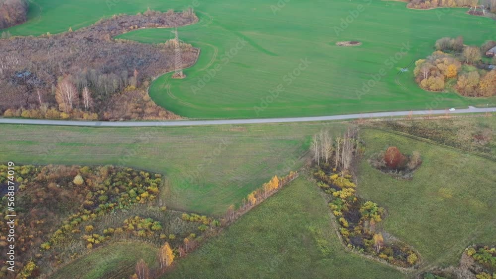October time farmland fields and groves in nature park, aerial view October time farmland fields and groves in nature park, aerial view