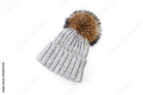 Gray winter hat with pompom isolated on white background.