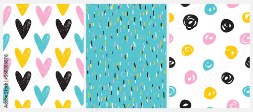Simple Colorful Abstract Doodle Seamless Vector Patterns. Black, Yellow, Blue and Pink Circles, Hearts and Lines Isolated on a Blue and White Background.  Cute Irregular Geometric Repeatable Print. 