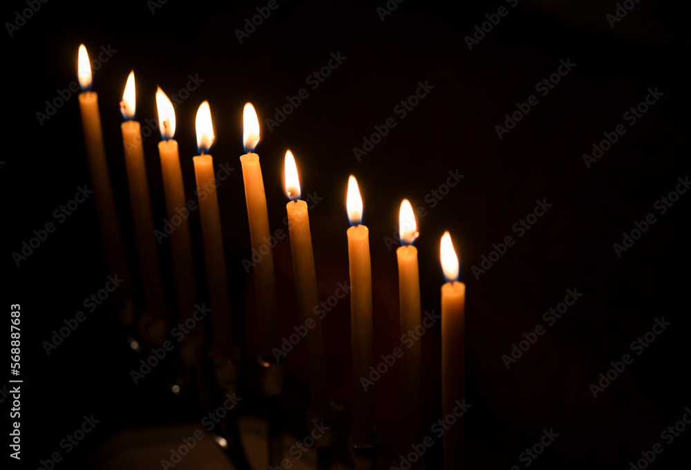 Row of candles against black background Stock Photo | Adobe Stock