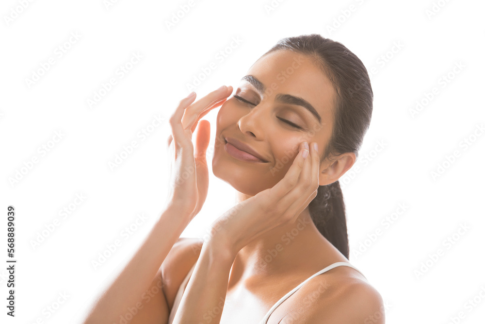 Portrait of smiling young woman doing face massage Portrait of smiling young woman doing face massage