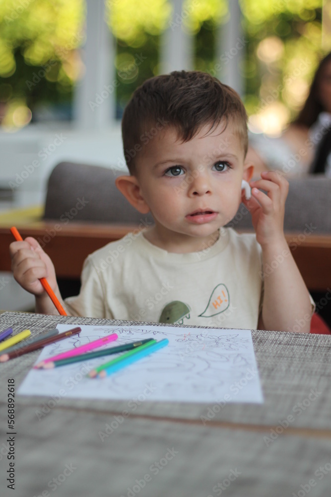 little child drawing with pencils little child drawing with pencils