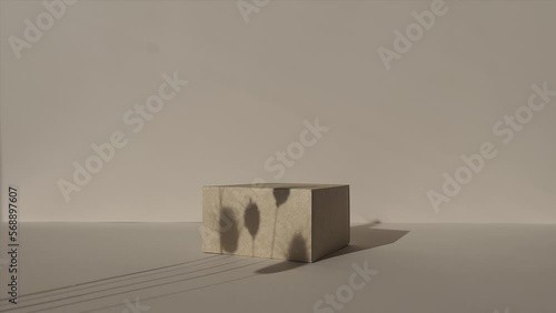 Square Podium on beige background. Product promotion.Pedestal with a cottonweed.Front view, studio photography.
