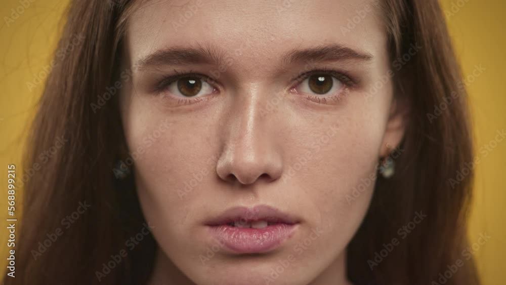 Caucasian woman looking at camera extreme close up Caucasian woman looking at camera extreme close up