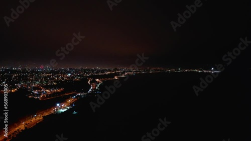 Fireworks display, Aerial drone view of fireworks over city skyline on New Years Eve. City Night Lights Celebration.
 photo