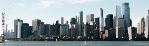 cityscape with contemporary skyscrapers and Hudson river in New York City  banner.