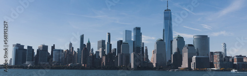 picturesque cityscape of Manhattan skyscrapers and Hudson river in New York City  banner.