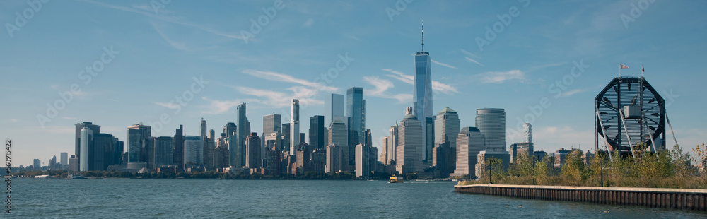 skyline with skyscrapers of Manhattan near Hudson river in New York City, banner.