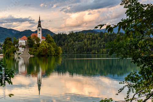 Church on island, lake and mountains background at Bled, Slovenia