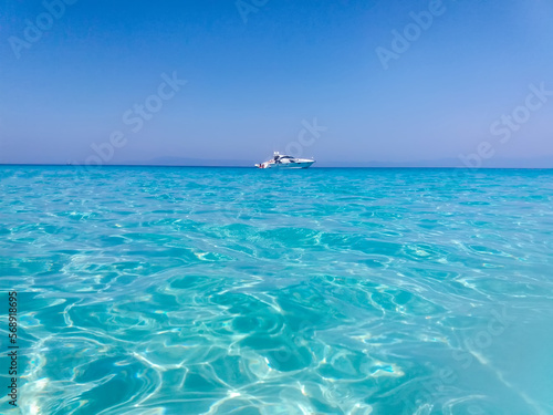 Blue sky and turquoise blue sea water. Like in paradise. Mega Portokali, Greek beach at Sithonia. Summer Holiday