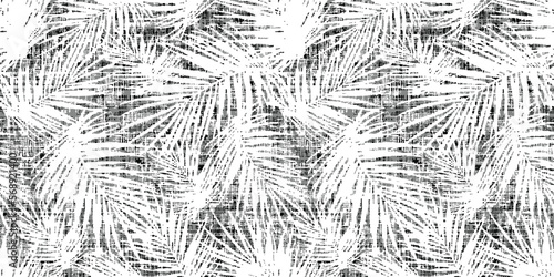 Seamless tropical pattern with palm leaves black white