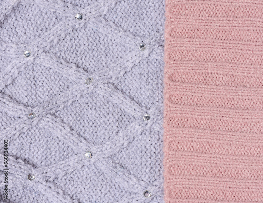 Texture of knitted gray pink fabric. Clothing detail