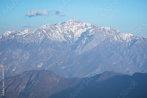 The alps of lake Como and lake lugano seen from val d'Intelvi during a sunny winter afternoon, near the village of Casasco d'Intelvi, Italy - February 2023. © Roberto