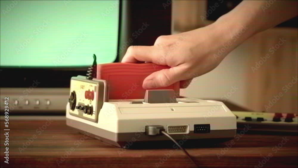 Old TV Game Console With ROM Cartridge Vintage Gamer Room Joystick And old-tv-game-console-with-rom-cartridge-vintage-gamer-room-joystick-and