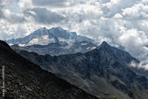 Dramatic view to the mountain peaks of Großelendkopf and Hochalmspitz with clouds, High Tauern National Park, Austrian Alps, Europe