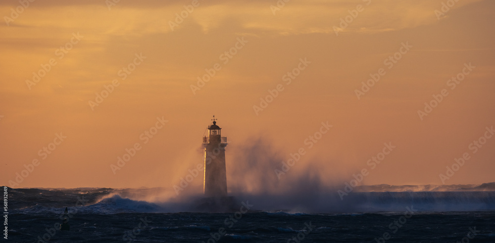 stormy weather, the rough sea are clashing into the lighthouse, during the sunset
stormy weather, the rough sea are clashing into the lighthouse, during the sunset