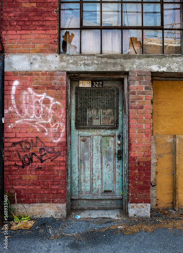 old door in a brick wall © Joerg