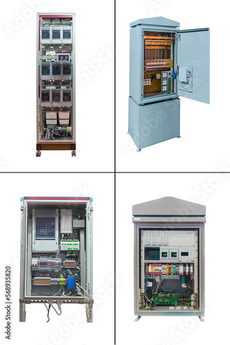 four electrical control cabinets with open door isolated on white background