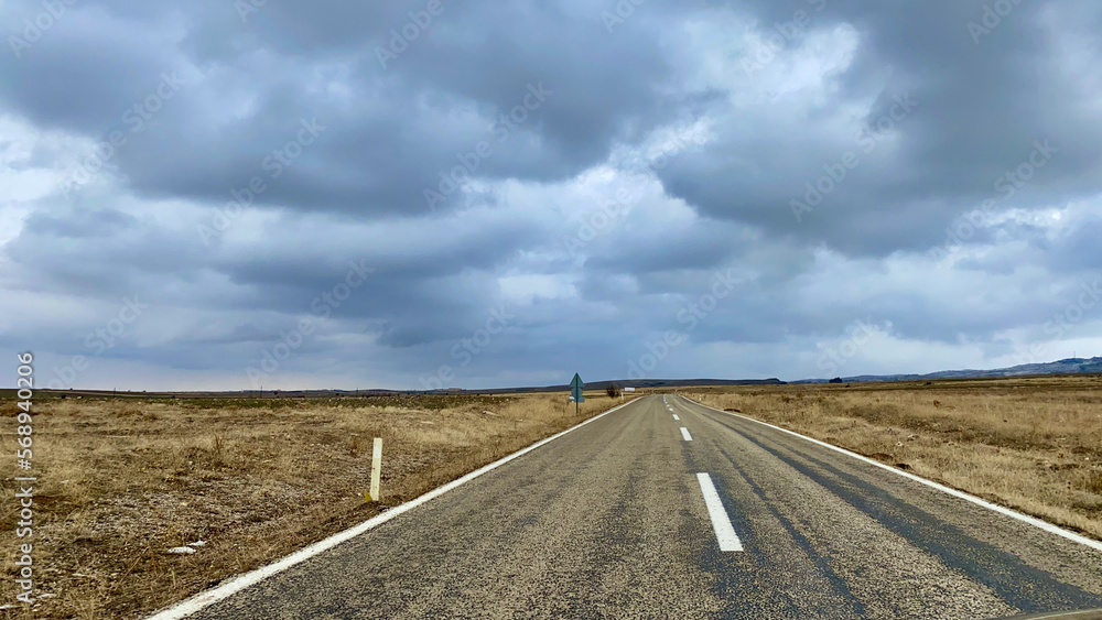 loneliness in on the way in cold winter time landscape road at near by Cappadocia Nevsehir city Middle of Anatolia, Turkey