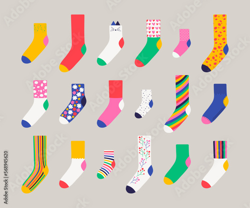 Set of colorful trendy socks. Wool, cotton warm accessories with modern patterns. Unisex clothes. Flat style vector illustration